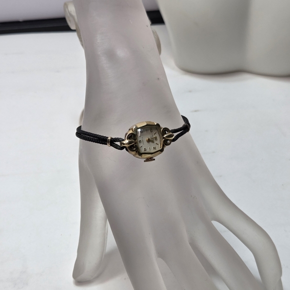 vtg cornell wms gold 17 jewels 10k rb bezel black corded band 7inch needs batter - Picture 6 of 9